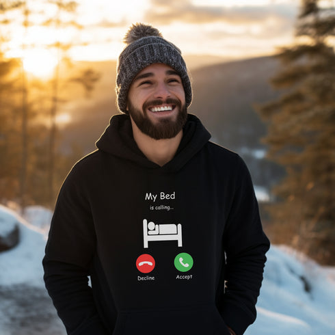 Introducing the ultimate hoodie for all those who love their bed more than anything else - the My Bed Is Calling hoodie! Featuring a hilarious stick figure lying in bed, this sweater is the perfect way to show off your love for all things cozy and comfortable.